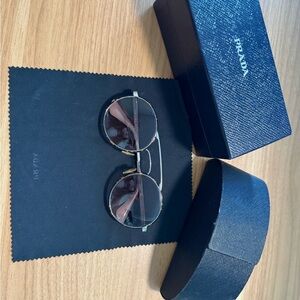 Prada Sunglasses with Black and Gold Detailing